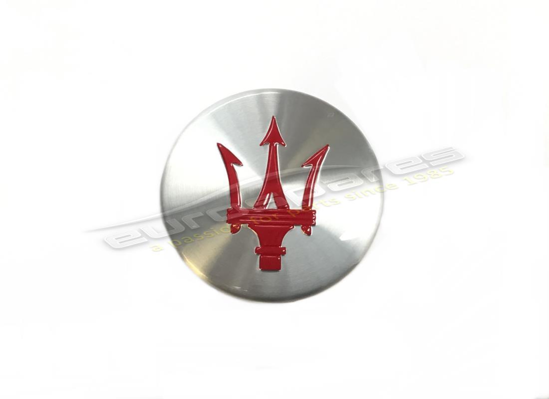 nouveau capuchon de centre de roue maserati. numéro de pièce 82364606 (1)